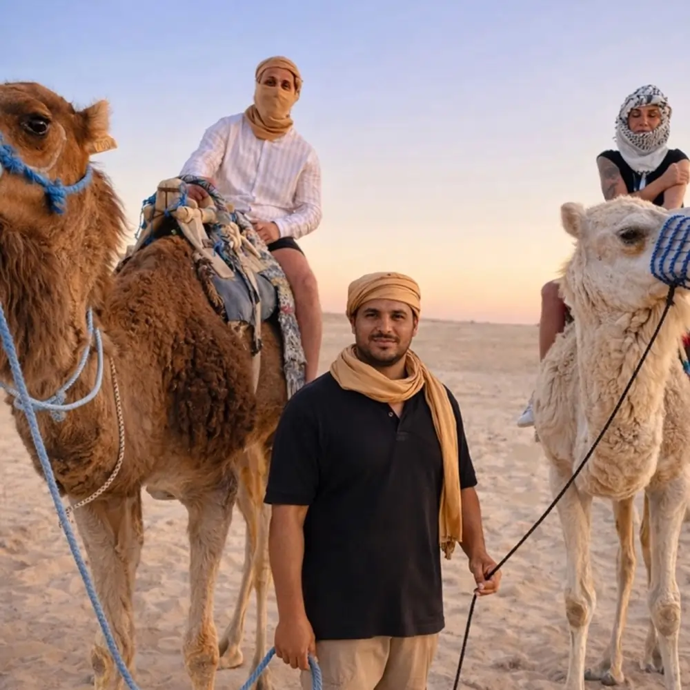 Camel riding in the Sahara Desert during private tours in Tunisia.