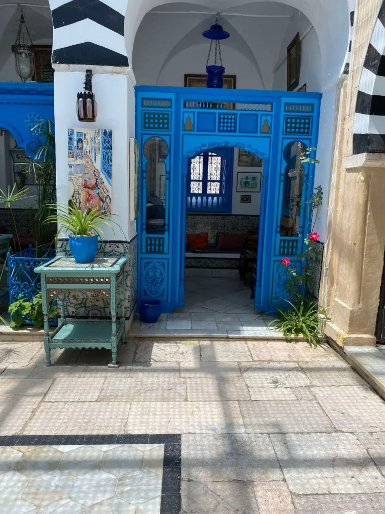 Traditional blue doors and white houses in Sidi Bou Said village Tunisia