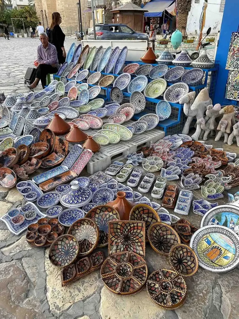 What to buy in Tunisia – traditional Tunisian ceramics handmade and painted plates in Medina souk